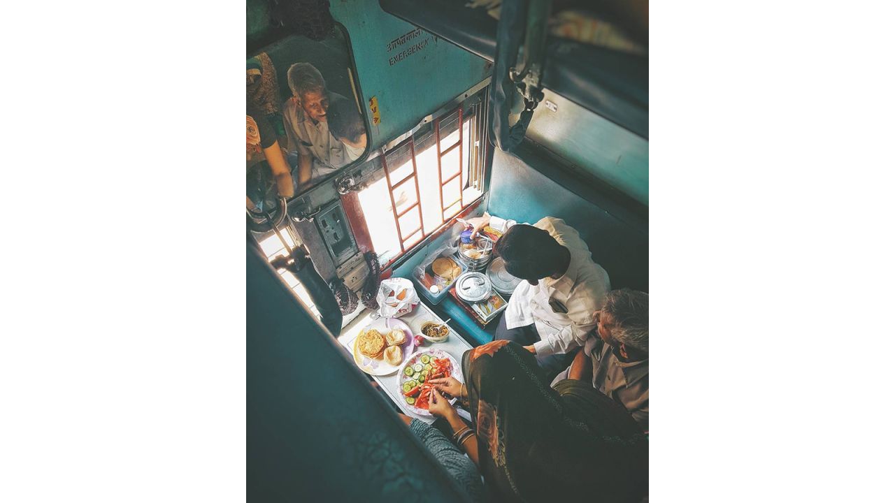 <strong>Train feasts: </strong>"This picture is recent,"<a href="https://www.instagram.com/p/Bbby6LJh8fn/?hl=en&taken-by=windowseatproject" target="_blank" target="_blank"> writes Babar</a>. "But it reminds me very much of my childhood, when the whole family would actively hold a feast in the train. Even though we were traveling there would be no compromises in the courses of our meals. There would be multiple curries, multiple kinds of breads, rice and more." <em>Pictured here: Daund.</em>