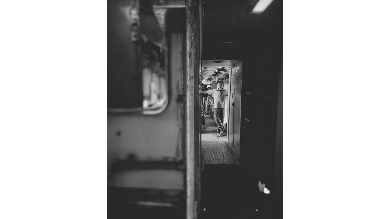 <strong>Economic means of travel:</strong> "In India, train is an economic means of travel," <a href="https://www.instagram.com/p/BaHP0EBBak9/?taken-by=windowseatproject" target="_blank" target="_blank">writes Babar in this caption. </a>The man in this photograph, Babar noticed, was taking it in turns to shifting his weight between his feet. When the right one hurts, he relieves it for some time, shifting his weight to the left one. <em>Pictured here: Onboard 11008 Deccan Express, Lonavala.</em>