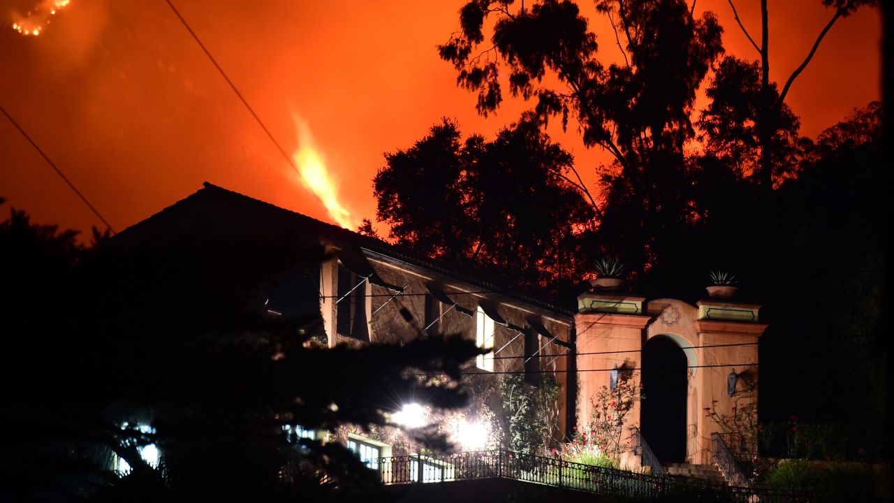 The Thomas Fire burns Monday in the hills above homes in Montecito in Santa Barbara County.