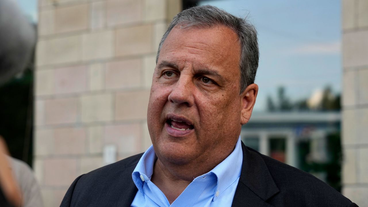 Republican presidential candidate former New Jersey Gov. Chris Christie speaks with reporters outside the Child Rights Protection Center in Kyiv, Ukraine, on Aug. 4. 