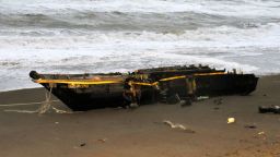 A wooden boat with Hangul character is washed ashore at a beach on December 12, 2017 in Kashiwazaki, Niigata, Japan. Two male bodies were found from the boat.  (Photo by The Asahi Shimbun via Getty Images)