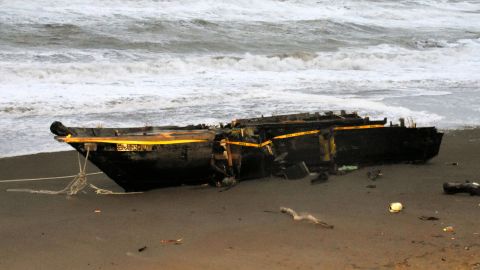 The wooden boat washed ashore at a beach on December 12, 2017 in Kashiwazaki, Niigata, Japan. 