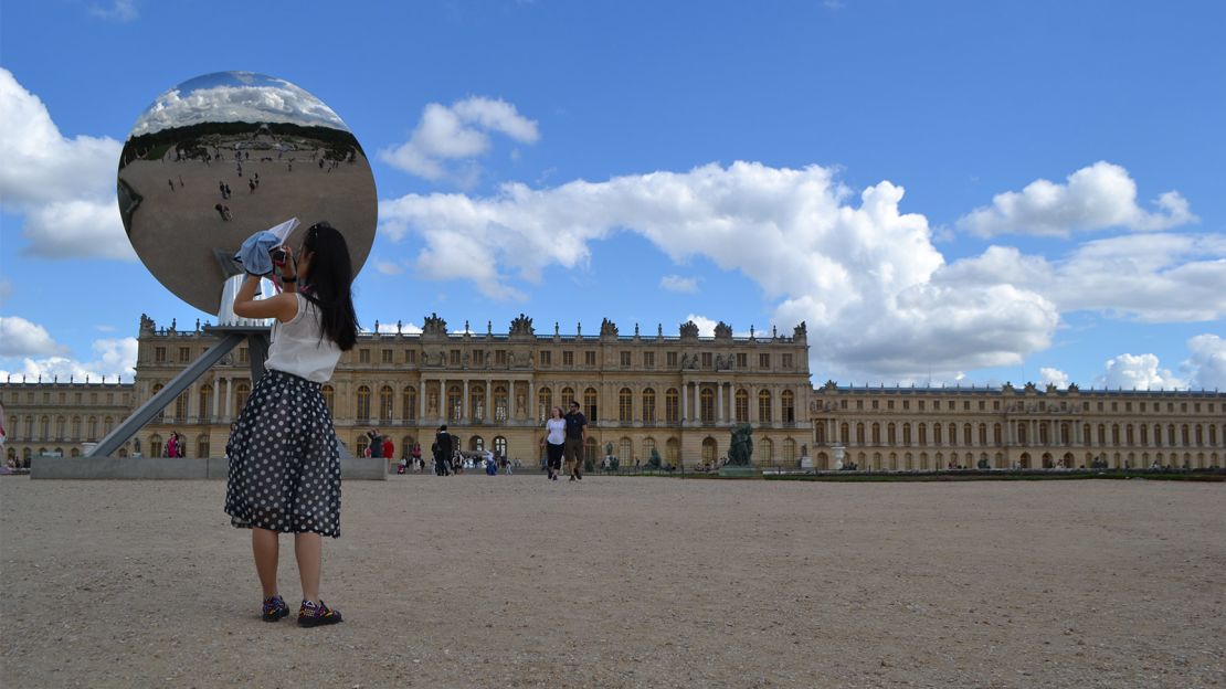 Anish Kapoor's "Sky Mirror" was selfie bait during its appearance at Versailles.