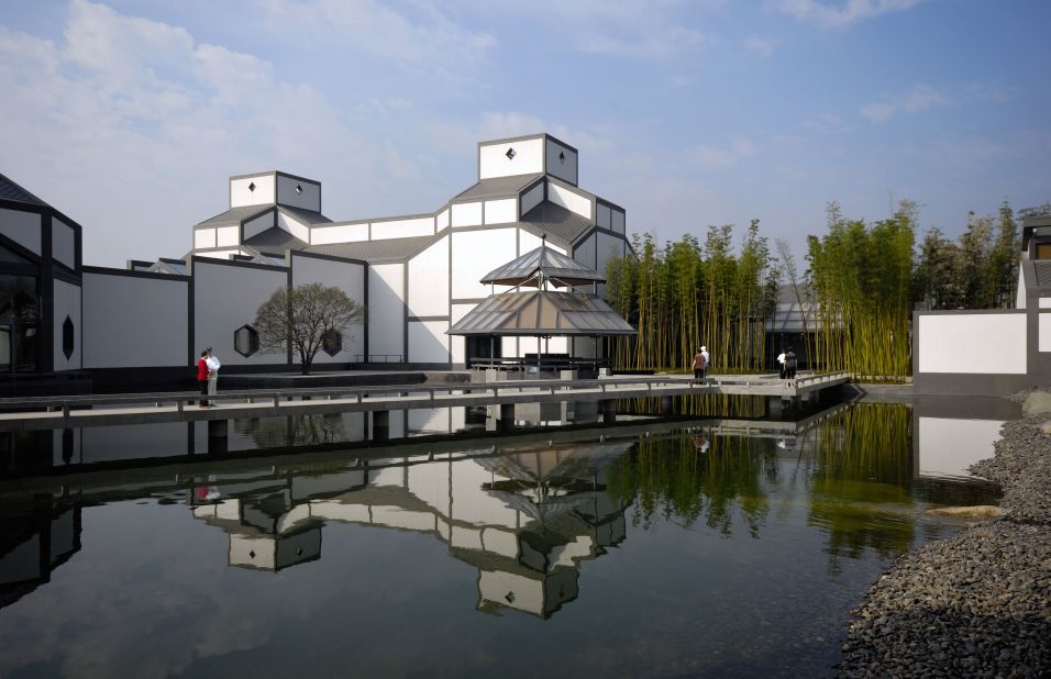 Although I.M. Pei grew up mostly in Hong Kong and Shanghai, he was born in Suzhou, so the commission to design the Suzhou Museum had unique personal resonance. Pei chose to combine his modern, geometric, architectural hallmarks with elements of traditional Chinese design. The museum has whitewashed walls and a gray roof, and a large Chinese garden with an artificial pond. Inaugurated in 2006, it houses a collection of Chinese paintings, calligraphy, arts and crafts, and excavated artifacts.  <br />