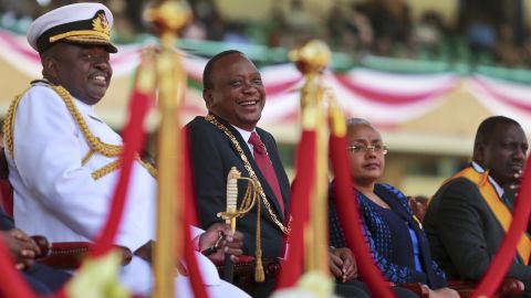 Kenya's President Uhuru Kenyatta, center, suffered through a difficult 2017.