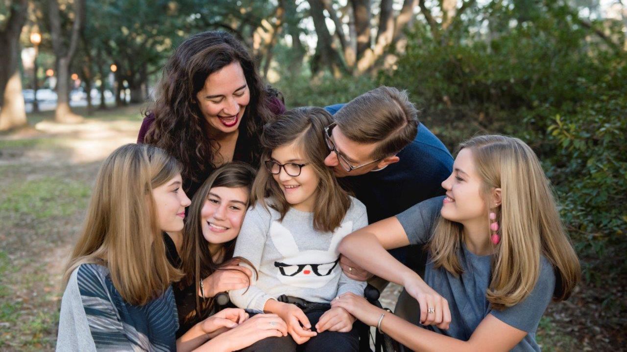 Avery's family helps her continue the lessons from her different therapies at home, including speech and physical therapy. But they also surround her with love. This photo was taken at Rice University, near the Reillys' house. From left are Presley, Helena, Emory, Avery, Brennan and Trinity.