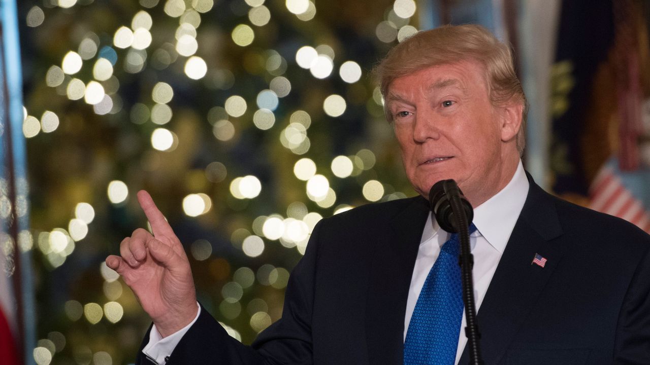 US President Donald Trump speaks about the tax reform legislation in the Grand Foyer of the White House in Washington, DC, December 13, 2017. / AFP PHOTO / SAUL LOEB        (Photo credit should read SAUL LOEB/AFP/Getty Images)