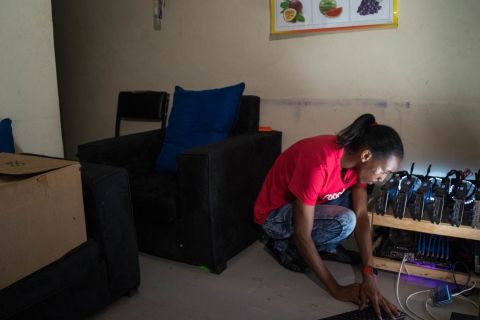 Eugene Mutai in his front room with his self-built cryptocurrency mining machine. Mutai is part of a growing tech scene on the continent. <br /><br /><strong>Meet the innovators and inventions driving Africa's tech revolution. </strong>