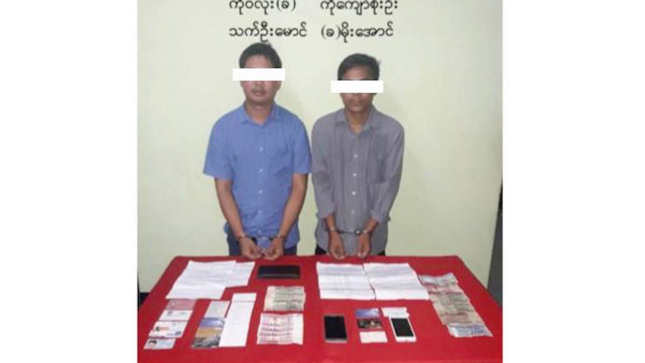 An altered image released by Myanmar's Ministry of Information shows two Reuters journalists, Wa Lone and Kyaw Soe Oo, in handcuffs.