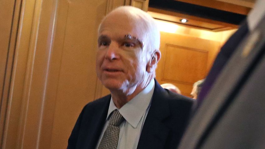 WASHINGTON, DC - JULY 25:  Sen. John McCain (R-AZ) walks to the U.S. Senate chamber July 25, 2017 in Washington, DC. McCain was recently diagnosed with brain cancer but returned on the day the Senate is holding a key procedural vote on U.S. President Donald Trump's effort to repeal and replace the Affordable Care Act.  (Photo by Mark Wilson/Getty Images)