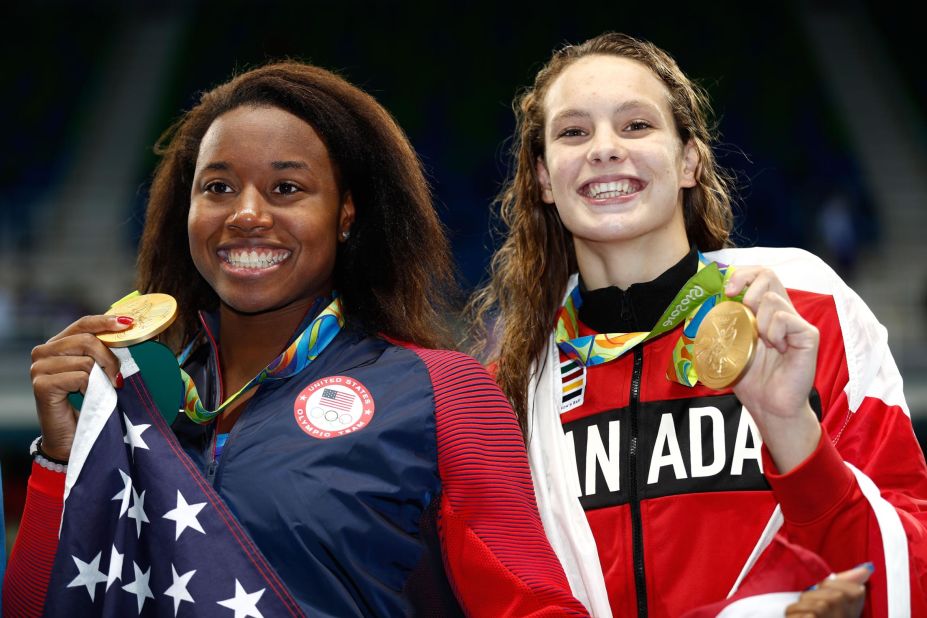 When Oleksiak (R) won the women's 100m freestyle final at Rio 2016, many of the headlines focused on the woman she tied with for gold. Simone Manuel of the US (L) was the first African-American Olympic swimming champion in history, but it should not be forgotten Oleksiak will still be just 17 years old when she competes on the Gold Coast.