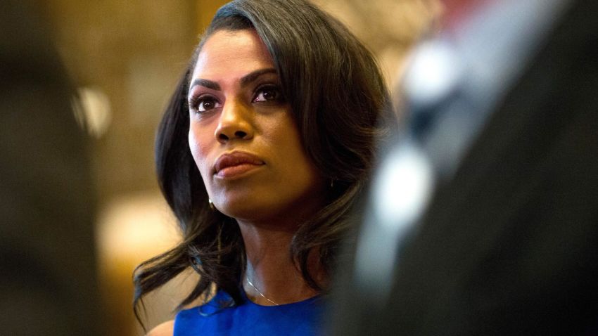 Omarosa Manigault, a staffer for US President-elect Donald Trump, listens as Martin Luther King III speaks to the media after meeting with the President-elect at Trump Tower in New York City on January 16, 2017. / AFP / DOMINICK REUTER (Photo credit should read DOMINICK REUTER/AFP/Getty Images)