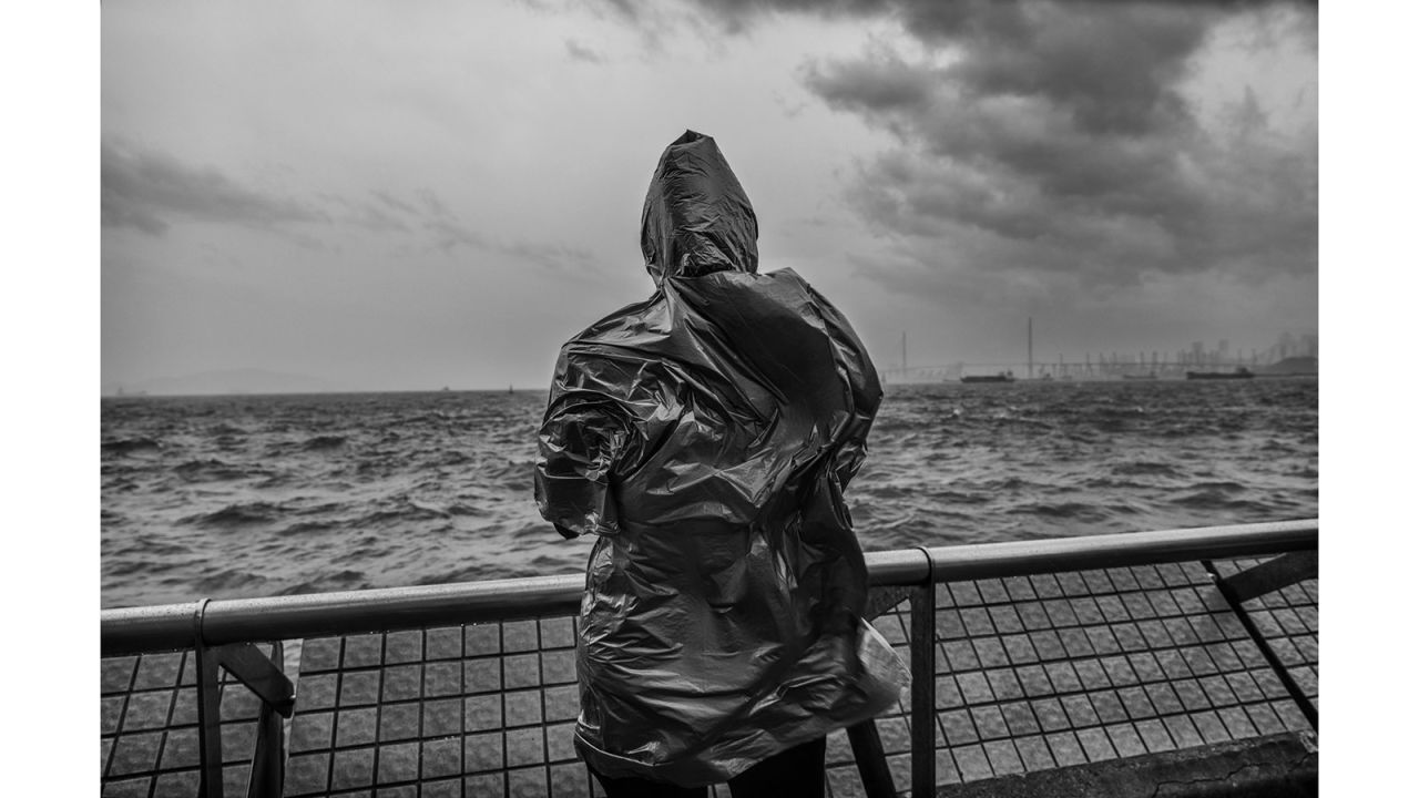Some of the pictures in "Wind, Water" capture dramatic scenes of Hong Kong during typhoons.