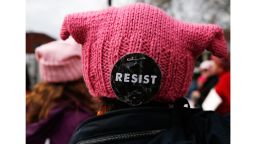 CAMBRIDGE, MA - MARCH 8: A Resist button is seen on the back of a hat as women gather to sing in Harvard Square in Cambridge, MA as part of a Day Without A Woman protest on Mar. 8, 2017. (Photo by Jessica Rinaldi/The Boston Globe via Getty Images)