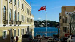 HAMILTON, BERMUDA - NOVEMBER 8: The flag of Bermuda flies in the city of Hamilton, Bermuda, November 8, 2017. In series of leaks made public by the International Consortium of Investigative Journalists, the Paradise Papers shed light on the trillions of dollars that move through offshore tax havens. (Drew Angerer/Getty Images)