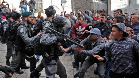 Israeli forces confront Palestinian protesters in Jerusalem's Old City.