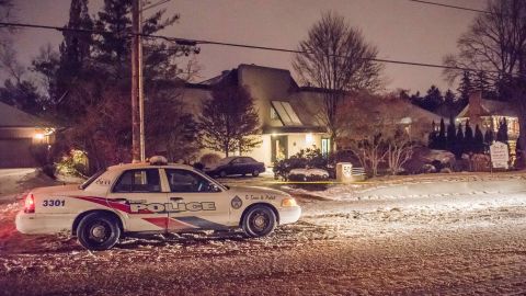 Police outside a Toronto residence after the bodies of Barry and Honey Sherman were found on December 15, 2017.