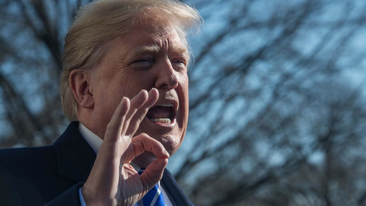 US President Donald Trump speaks to the press at the White House in Washington, DC on December 16, 2017 before departing for the Camp David presidential retreat in Maryland. / AFP PHOTO / NICHOLAS KAMM        (Photo credit should read NICHOLAS KAMM/AFP/Getty Images)