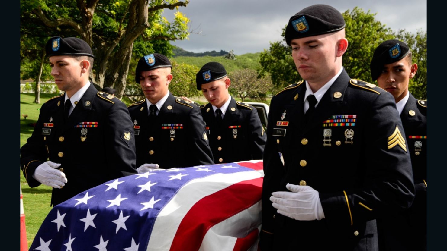 Soldiers escort the remains of US  Army Pfc. Albert E. Atkins on Friday in Honolulu, Hawaii. 