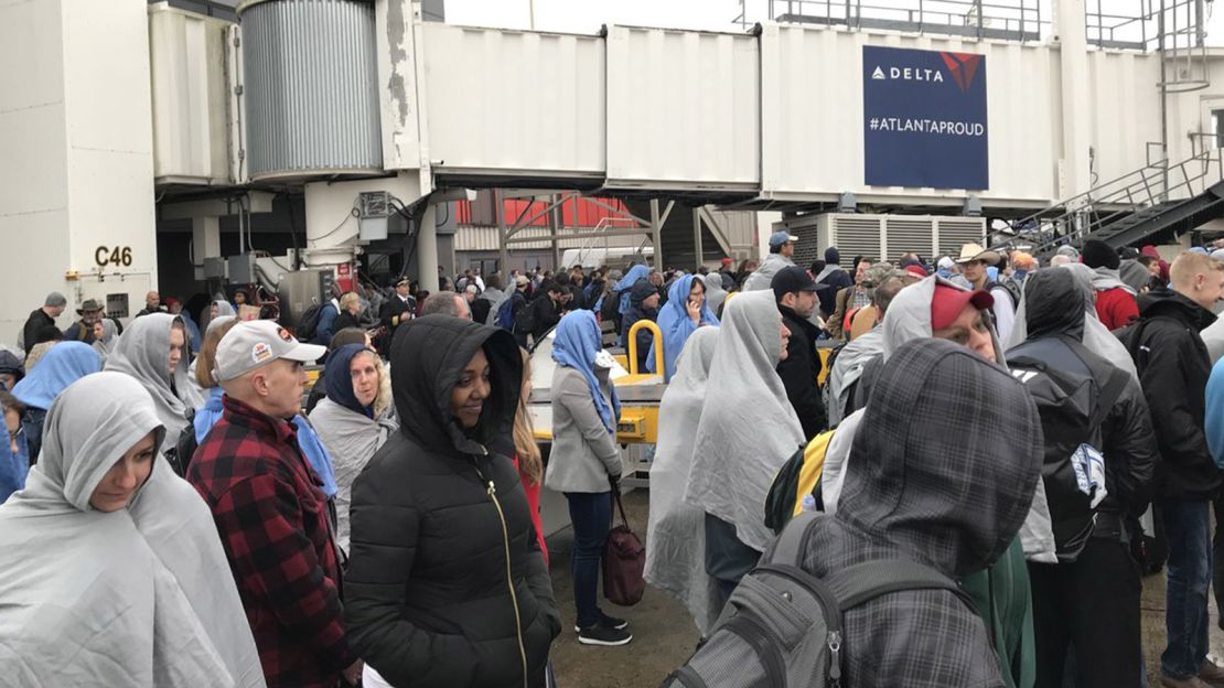 Passengers at Hartsfield-Jackson International Airport after Sunday's power outage. 