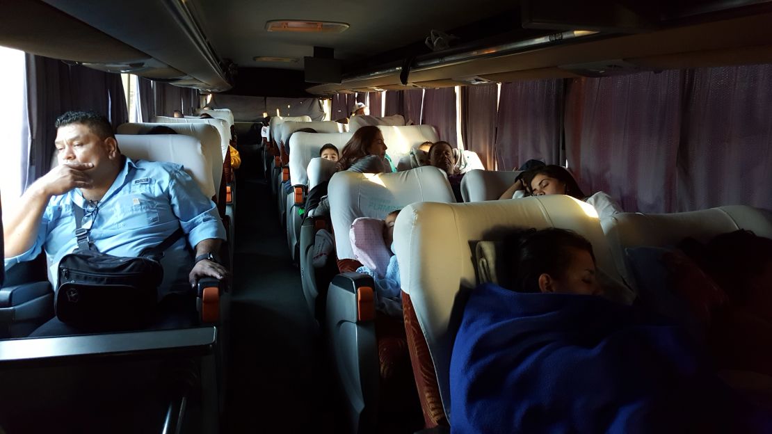 Passengers on this bus tried to catch some sleep as the journey took them through rural Venezuela. 