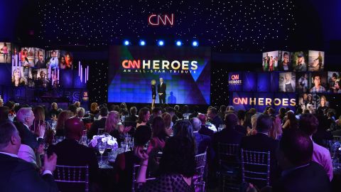 Co-hosts Kelly Ripa and Anderson Cooper speak onstage during 2017's CNN Heroes tribute gala, held on December 17 at the American Museum of Natural History in New York City.