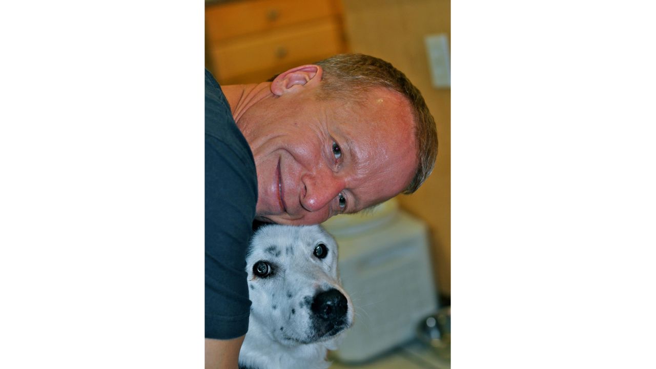 Eric O'Grey with Peety, the shelter dog he adopted.