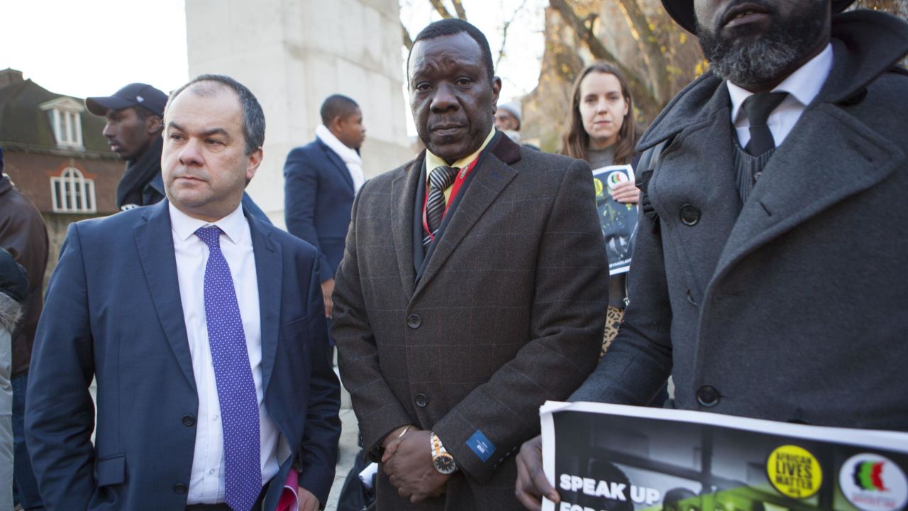 Paul Scully, left, joined anti-slavery campaigners outside parliament earlier on Monday.