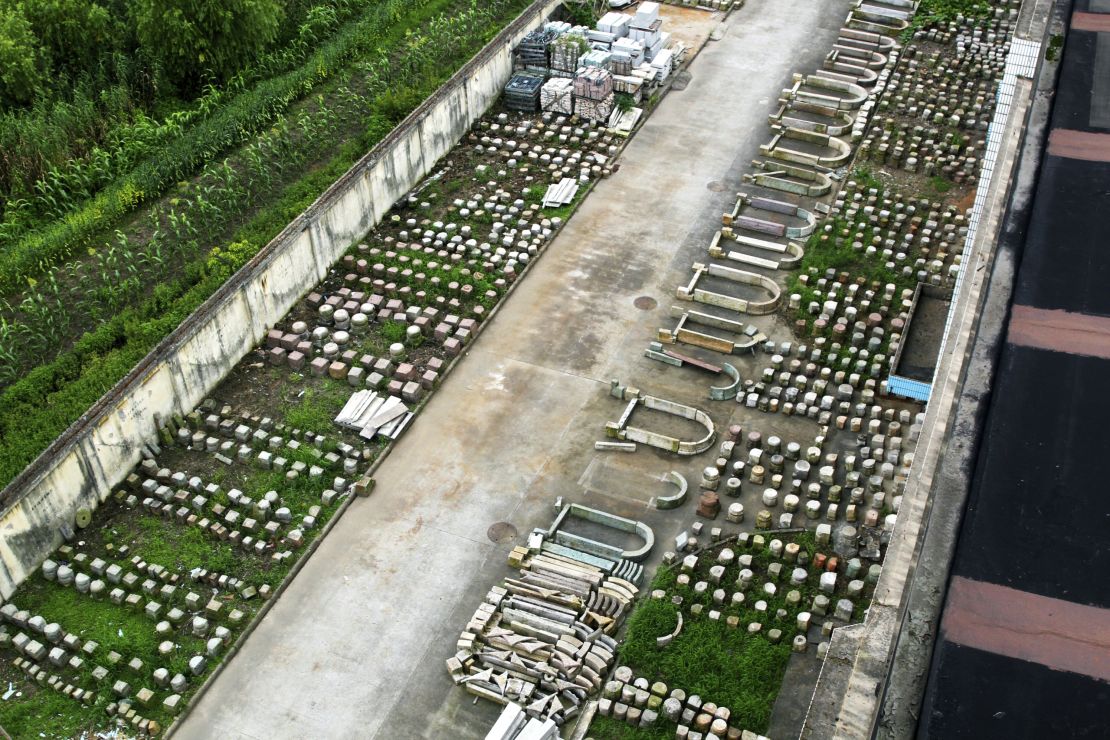 Bricks and stones are organized and stored before they are used to build the new resort in Shanghai.