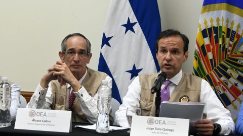 OAS representatives Alvaro Colom, left, and Jorge Tuto Quiroga at a press conference in Tegucigalpa, Honduras.