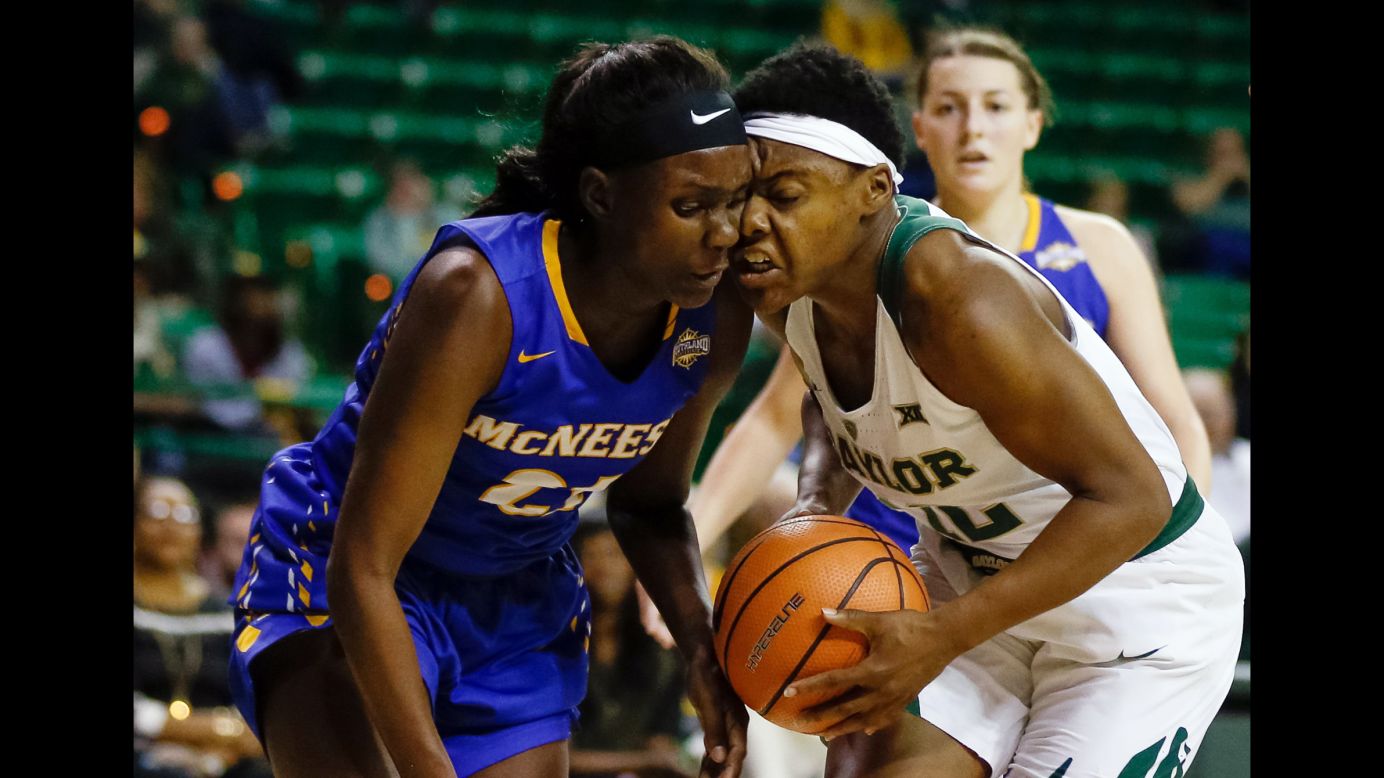 McNeese State forward Mercedes Rogers bumps heads with Baylor guard Moon Ursin during a college basketball game in Waco, Texas, on Wednesday, December 13.