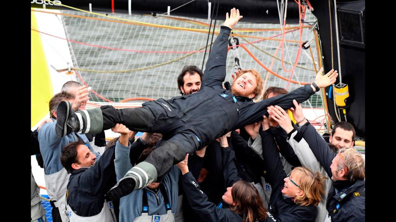 Francois Gabart celebrates Sunday, December 17, after he became the fastest person to sail solo nonstop around the world. The 34-year-old Frenchman left Ouessant, off the west coast of France, on November 4 and raced eastward around the globe to finish in 42 days, 16 hours, 40 minutes and 35 seconds. <a href="index.php?page=&url=http%3A%2F%2Fwww.cnn.com%2F2017%2F12%2F18%2Fsport%2Ffrancois-gabart-round-the-world-record-sailing%2Findex.html" target="_blank">He shattered the previous record</a> by more than six days.