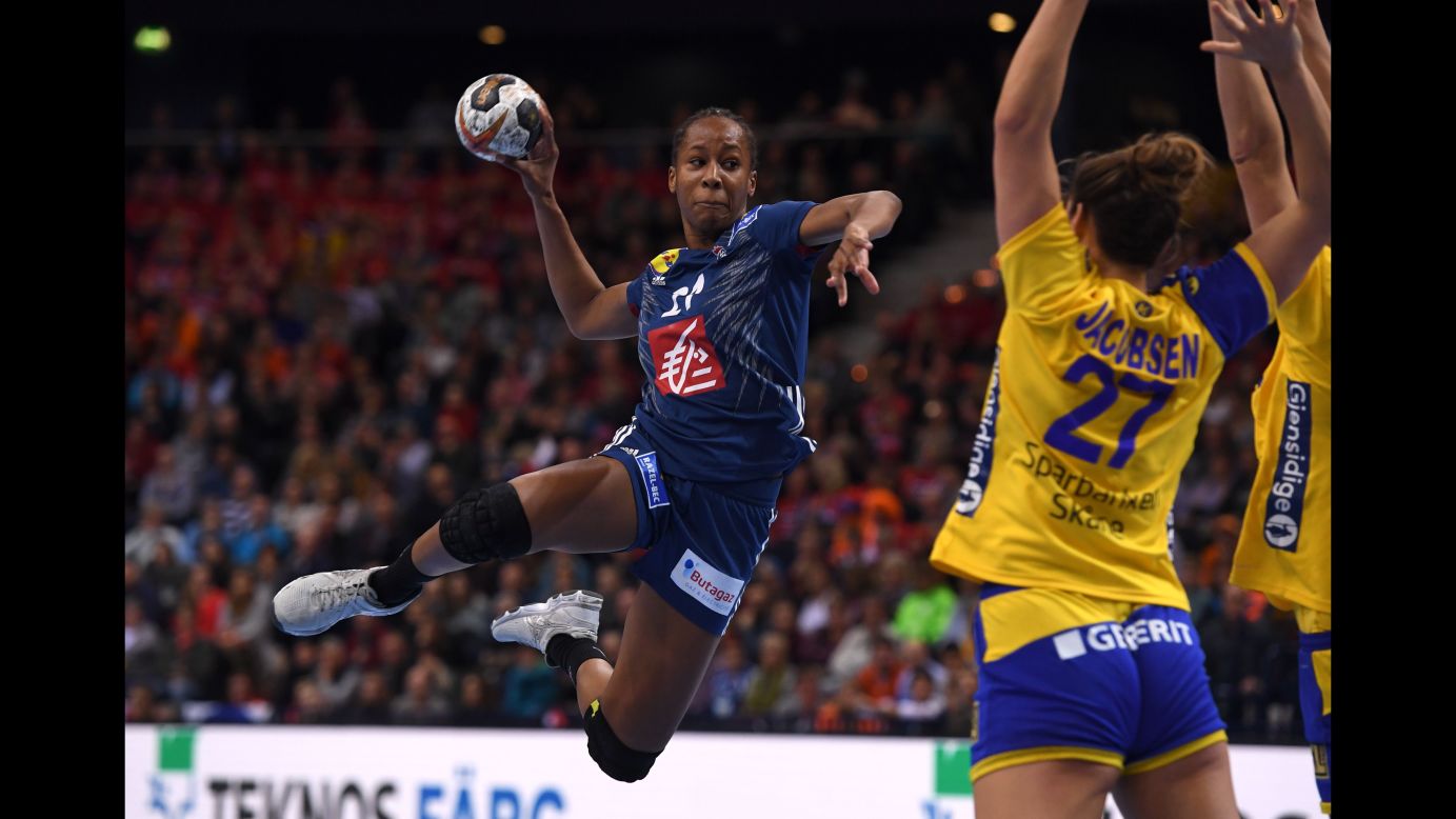 France's Orlane Kanor shoots Friday, December 15, during the semifinals of the Women's Handball Championship. France defeated Sweden and then went on to beat Norway in the final.