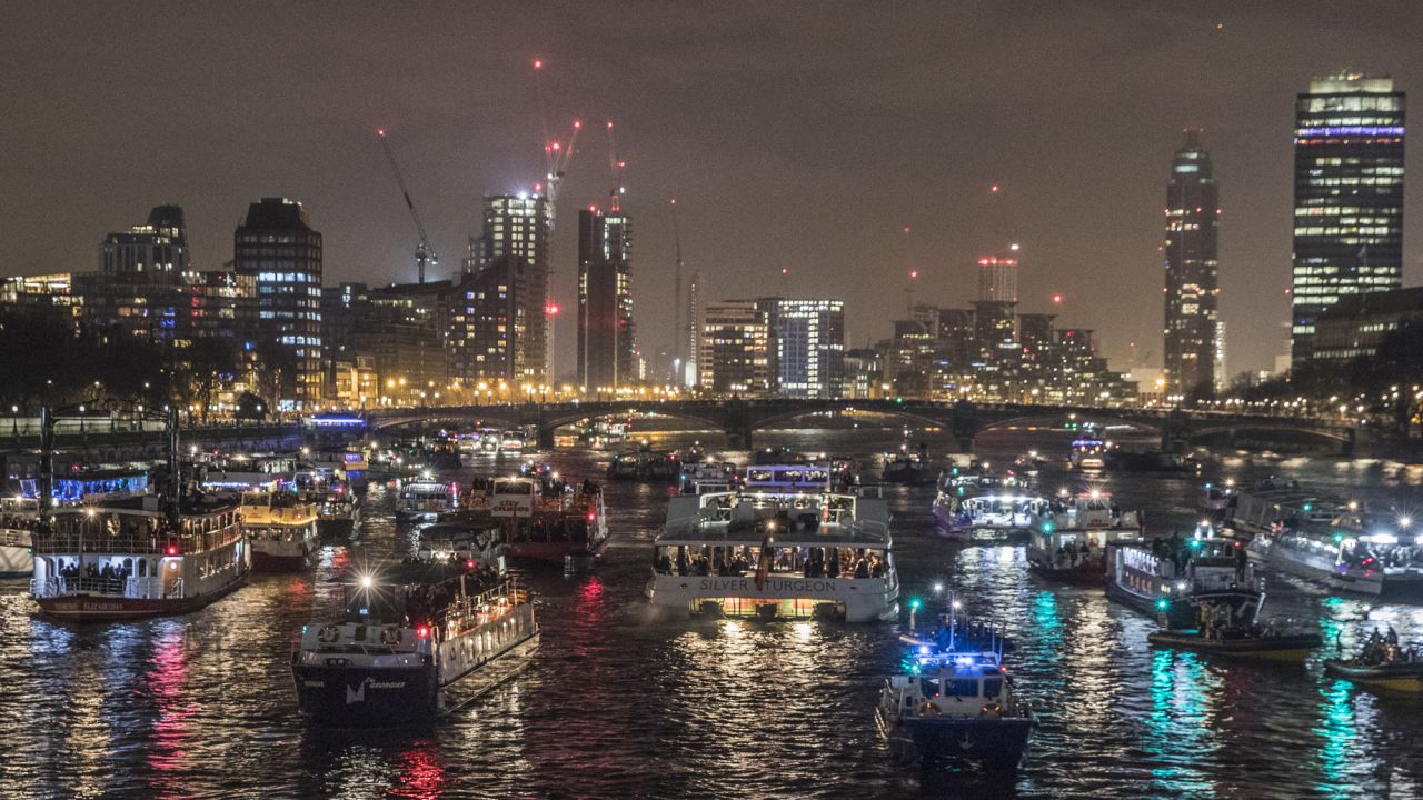 <strong>London, England:</strong> Boats line up in the Thames after New Year's Eve fireworks.