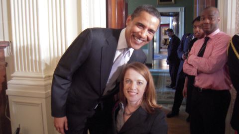 Rebecca Cokley and President Obama pose for a snapshot.