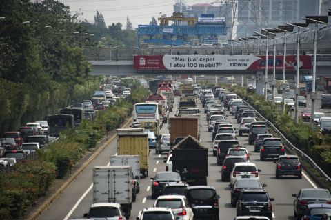 A traffic jam on a Jakarta highway. If you drive here during rush hour traffic, expect to spend up to 63 hours stuck in congestion per year, as drivers in the city did in 2017.