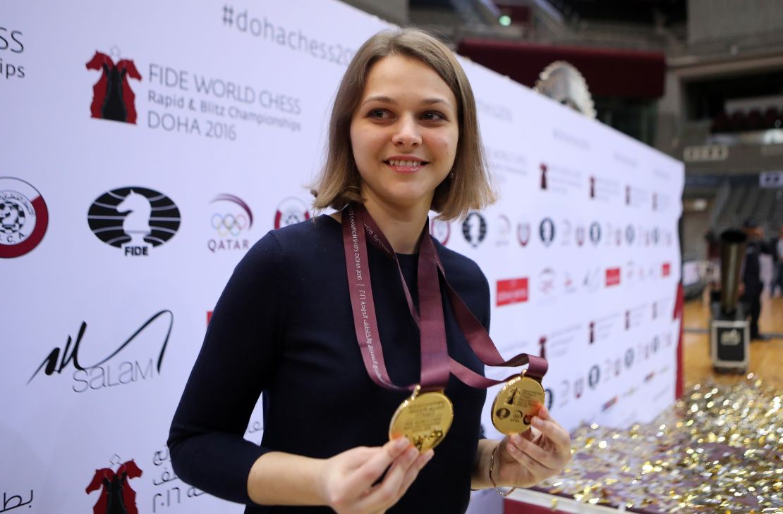 Ukraine's grandmaster Anna Muzychuk celebrates after winning two gold medals in the FIDE  World Chess Rapid & Blitz Championships 2016, in the Qatari capital Doha on December 30, 2016.  