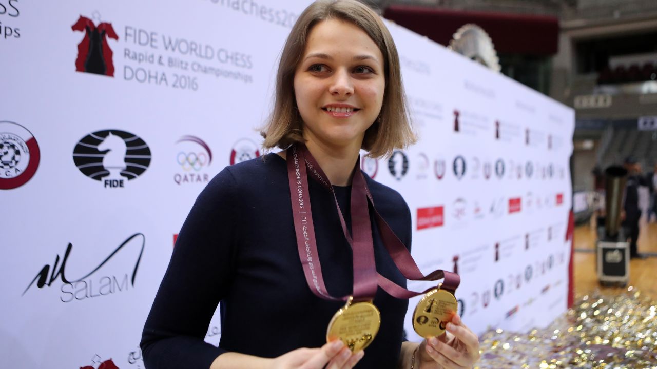 Ukraine's grandmaster Anna Muzychuk celebrates after winning two gold medals in the FIDE  World Chess Rapid & Blitz Championships 2016, in the Qatari capital Doha on December 30, 2016.  