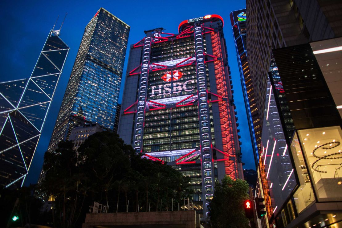 Bank of China Tower, from left, Cheung Kong Center, Bank of China Building, HSBC Holdings Plc headquarters, Standard Chartered Bank building and Prince's Building stand illuminated in the Central district of Hong Kong.