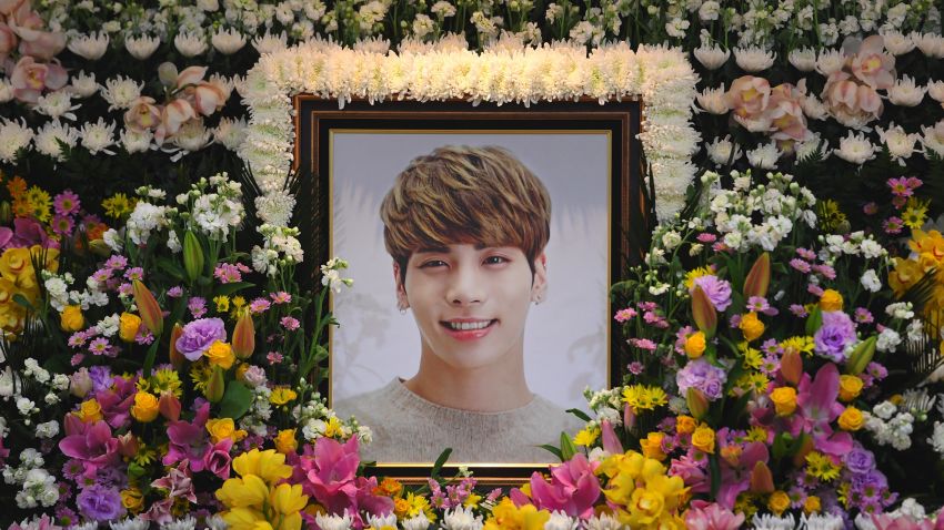 The portrait of Kim Jong-Hyun, a 27-year-old lead singer of the massively popular K-pop boyband SHINee, is seen on a mourning altar at a hospital in Seoul on December 19, 2017.
The top K-pop star bemoaned feeling "broken from inside" and "engulfed" by depression in a suicide note, it emerged on December 19, as his death sent shockwaves across K-pop fans worldwide.  / AFP PHOTO / pool / CHOI Hyuk        (Photo credit should read CHOI HYUK/AFP/Getty Images)