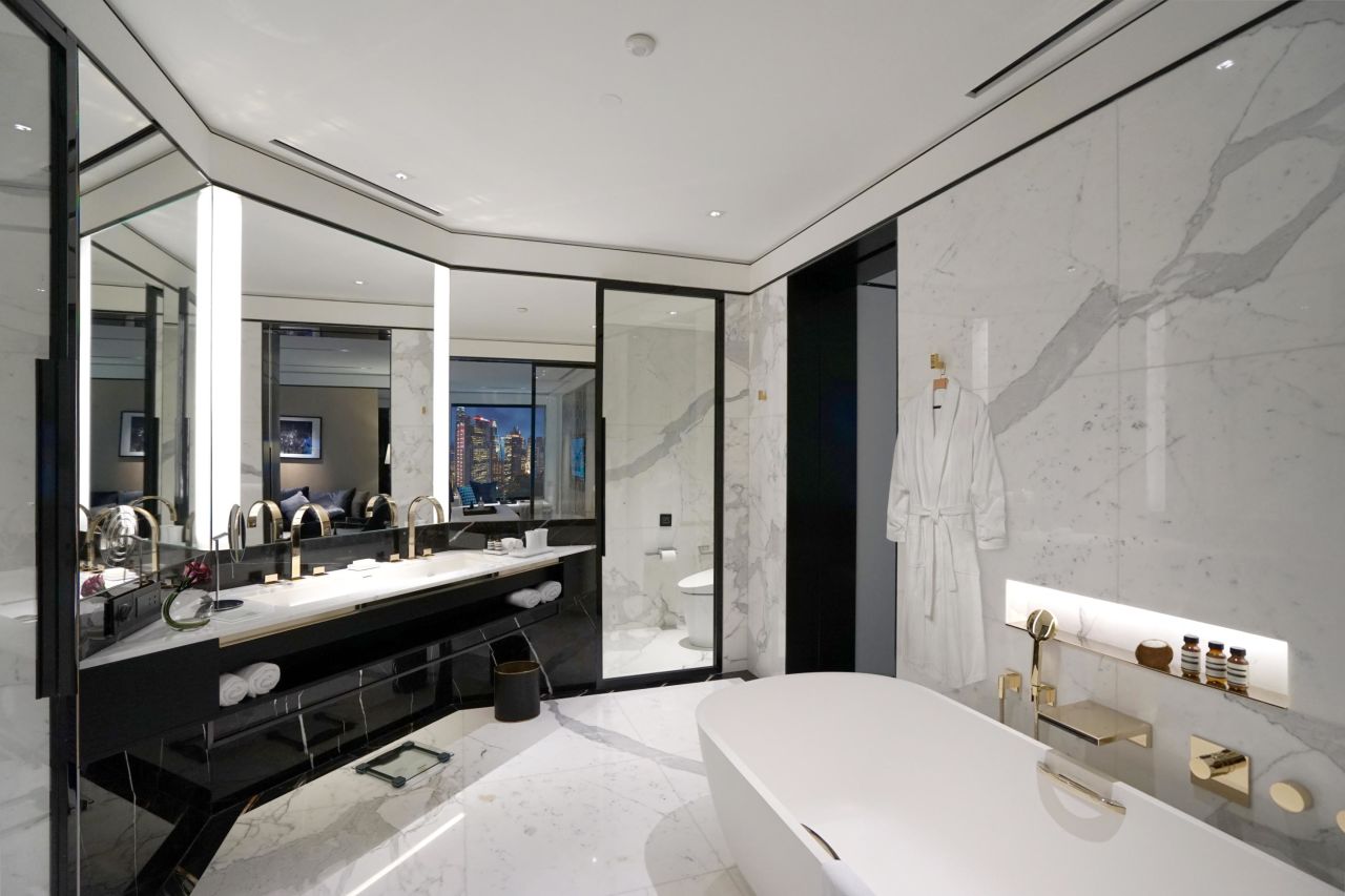 <strong>The Murray, Hong Kong</strong>: In the 336 rooms, amenities include all-marble bathrooms, harbor views, herringbone wood floors and a muted palette with glamorous bronze accents.