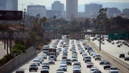 Motorists make their way out of downtown Los Angeles headed east on the Interstate 10 freeway on August 30, 2013 in California, where more Southern California residents are taking Labor Day weekend trips this year compared to in 2012, according to the Automobile Club of Southern California.  Some 2.44 million residents have plans for a trip of at least 50 miles from home this Labour Day weekend, with about 1.93 million  expected to drive, up 6.2 percent from 1.82 million last year, according to the Auto Club. AFP PHOTO/Frederic J. BROWN        (Photo credit should read FREDERIC J. BROWN/AFP/Getty Images)