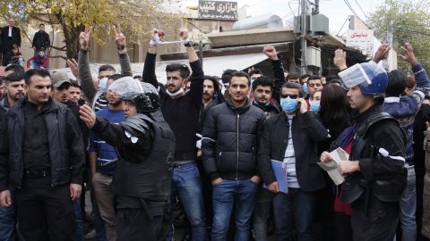 Iraqi Kurdish protesters shout slogans in Sulaymaniyah on December 19.