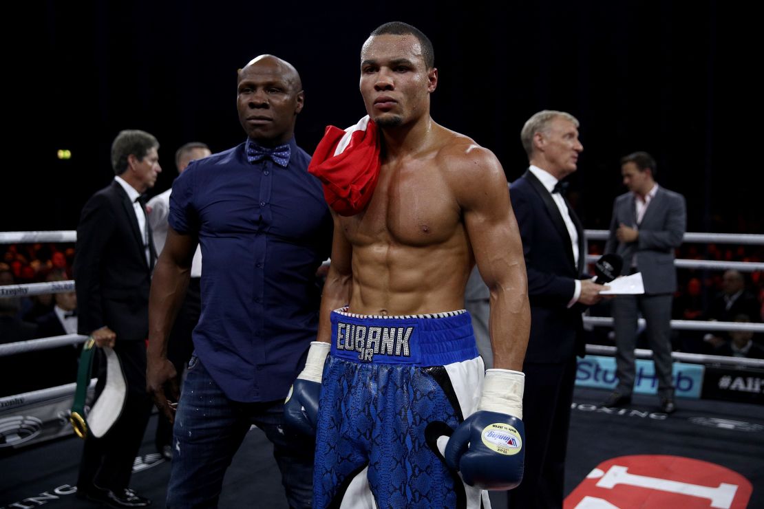 Chris Eubank Jr. in the ring with his dad, after his victory over Avni Yildirim in October 2017.