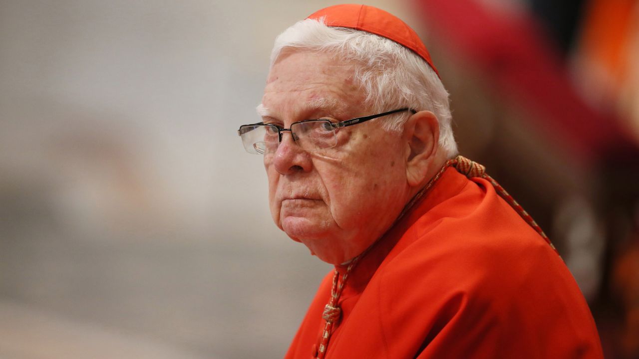 Cardinal Bernard Francis Law looks on as Pope Francis celebrates Mass in 2016 in Vatican City.