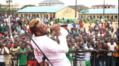 Nigerian singer Lamboginny performs in front of prisoners at Kirikiri Prison, Lagos