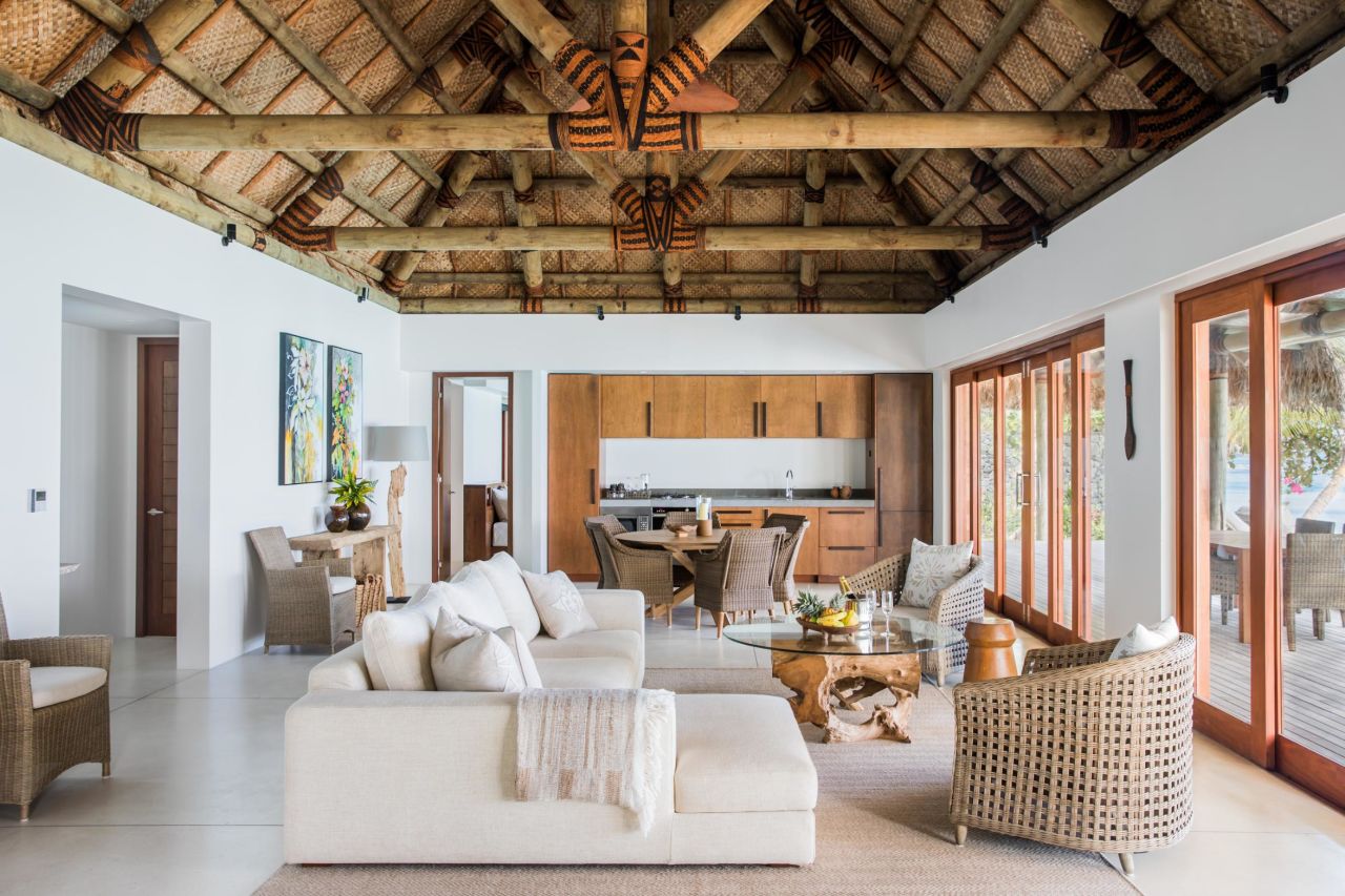 <strong>Kokomo Private Island: </strong>Striking a balance between rustic Fijian and sustainably minded contemporary decor, the resort makes a great first impression -- picture a soft gray and bright white palette, pretty knotty wood tables, and traditionally woven vaulted ceilings.