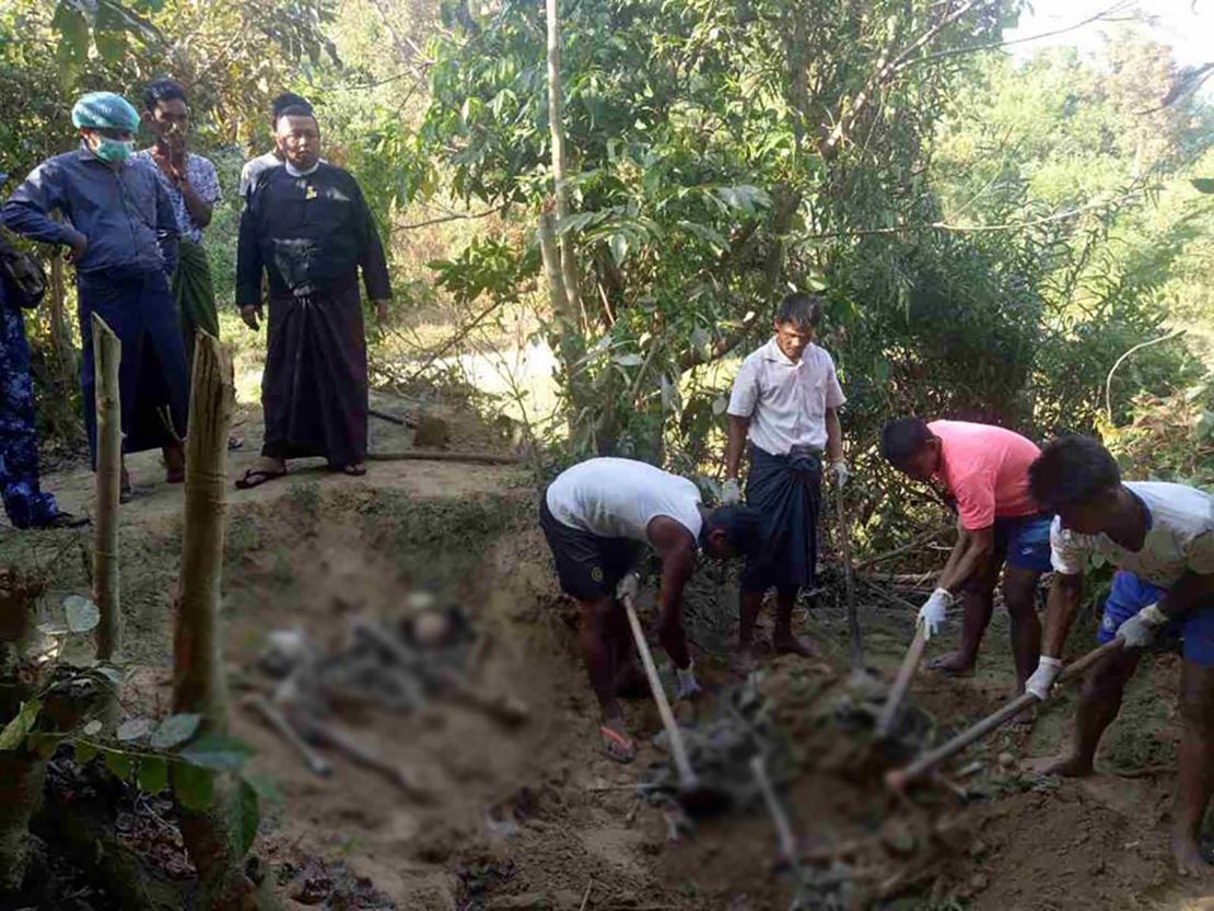 Authorities in Rakhine state work to uncover a mass grave found in a village north of the provincial capital Sittwe.
