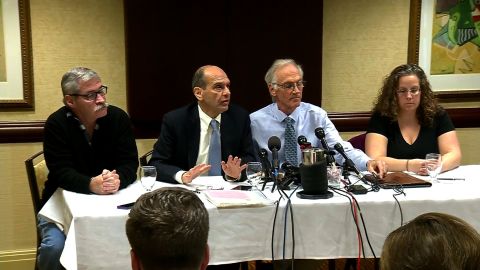 From left to right, Robert Costello, attorney Mitchell Garabedian, Phil Saviano and Alexa MacPherson speak at Garabedian's Boston office about the death of Cardinal Bernard Law on Wednesday.