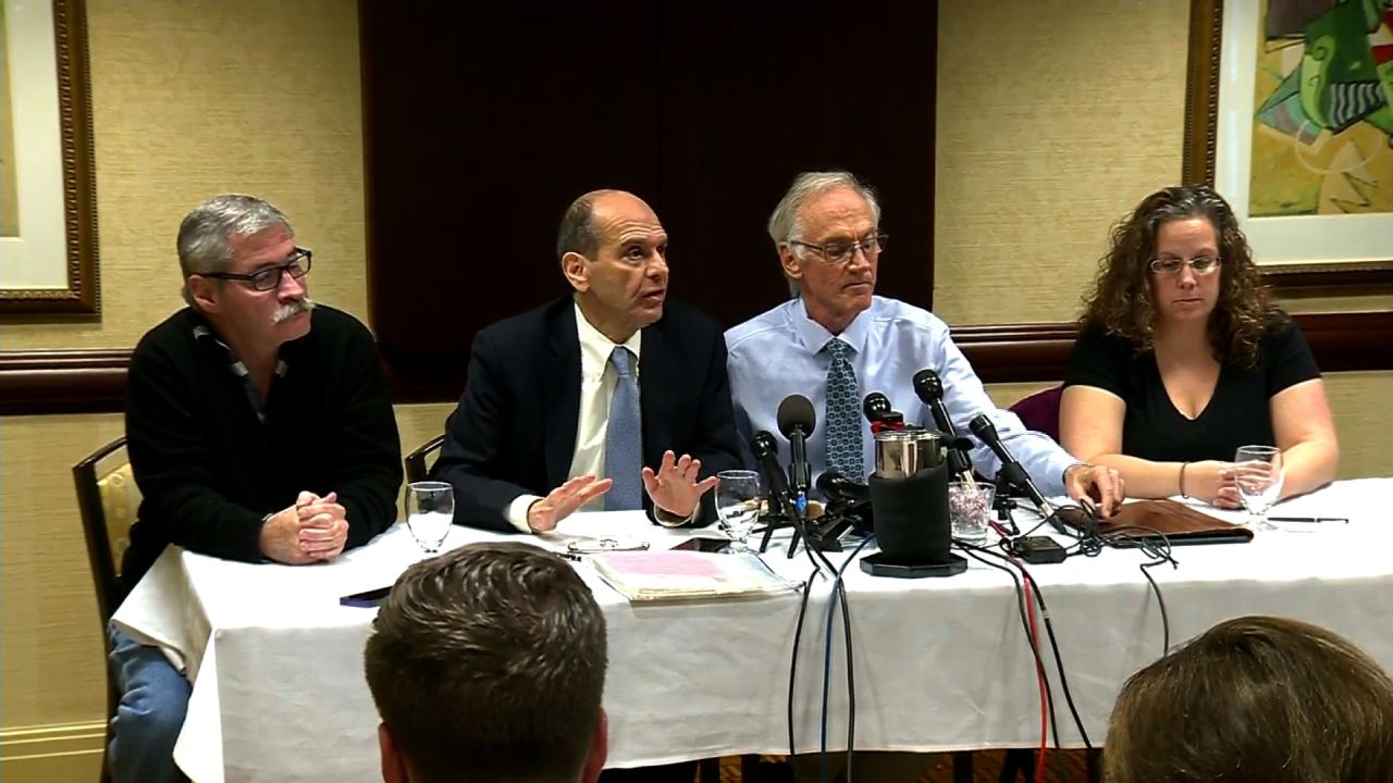 From left to right, Robert Costello, attorney Mitchell Garabedian, Phil Saviano and Alexa MacPherson speak at Garabedian's Boston office about the death of Cardinal Bernard Law on Wednesday.